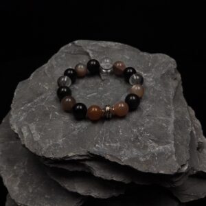 12mm skeletal stone, clear quartz, black obsidian, 37 grams, 16cm 17cm in diameter.